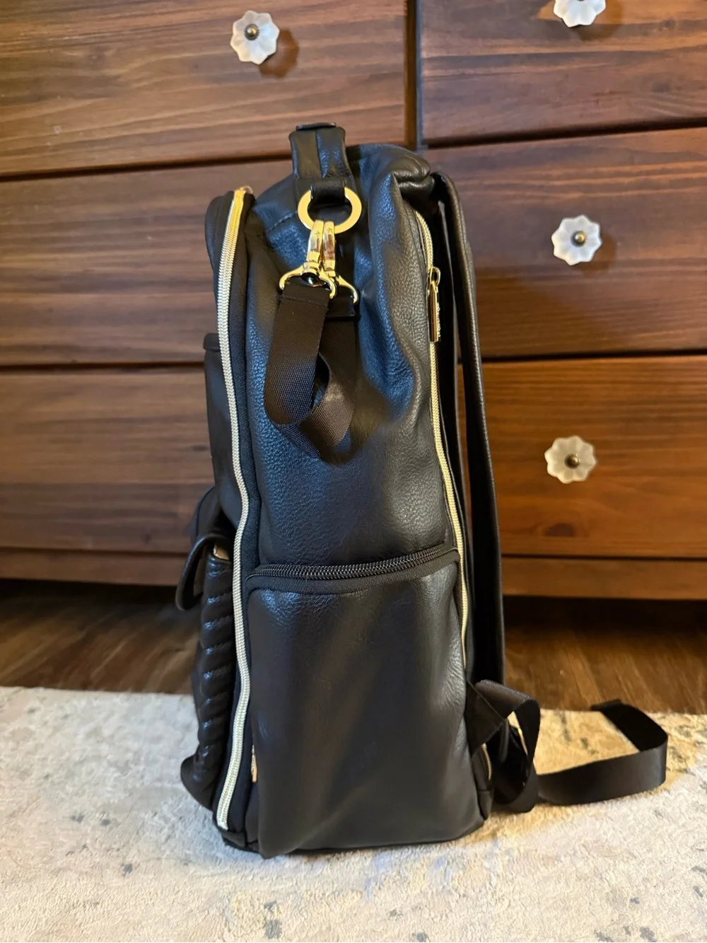 Itzy Ritzy Black Quilted Backpack with Gold Hardware